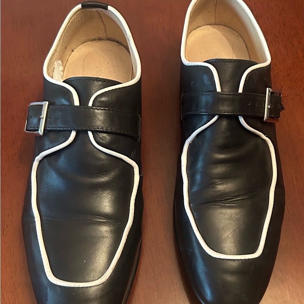 Sleek Black Leather Loafers with White Accents
European size 8 run small (us-7)
